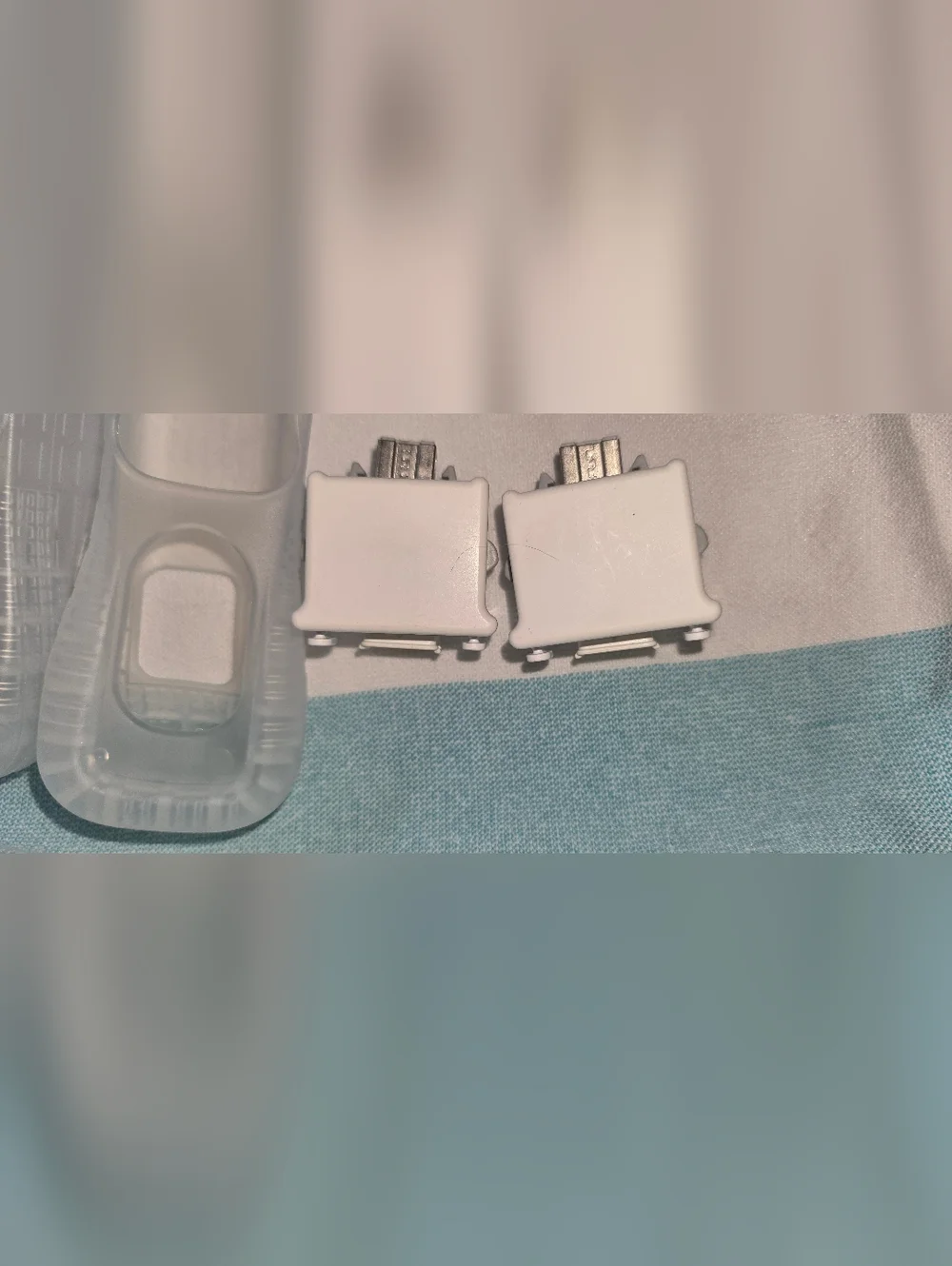 2 Pack of Genuine Nintendo Wii Motion Plus Adapter and Silicon Cases